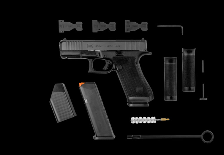 Contenu de la mallette Glock Gen 6 comprenant chargeurs, accessoires et plaques optiques